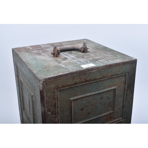 190 - A 19th century Victorian Coalbrookdale cast iron safe. Upright form with large handle and lock key p... 