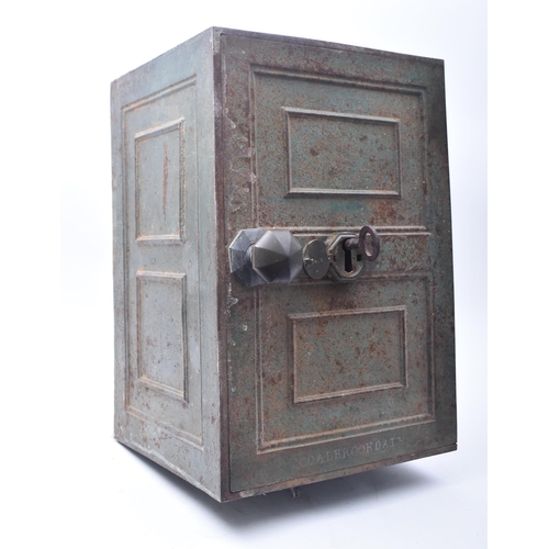 190 - A 19th century Victorian Coalbrookdale cast iron safe. Upright form with large handle and lock key p... 