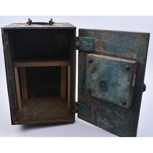 190 - A 19th century Victorian Coalbrookdale cast iron safe. Upright form with large handle and lock key p... 