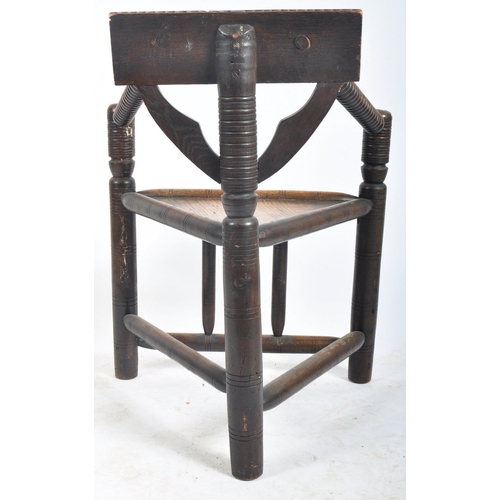 191 - A Victorian 19th century carved oak Warwick design turner's chair. The chair with a chip carved back... 