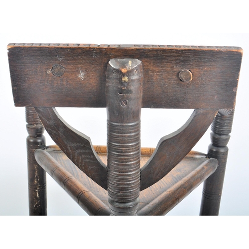 191 - A Victorian 19th century carved oak Warwick design turner's chair. The chair with a chip carved back... 