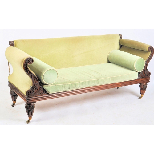 194 - A William IV 19th century mahogany framed three seater settee in green upholstery. The sofa having a... 