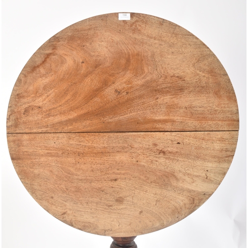 198 - An 18th century George III mahogany tilt top pedestal table. The table having a mahogany circular to... 