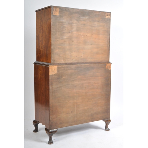 201 - A Queen Anne revival bow fronted mahogany chest on chest of drawers / tallboy. The tallboy being rai... 