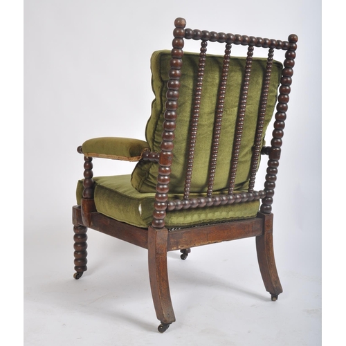 220 - A Victorian 19th Century mahogany William & Mary manner bobbin turned armchair. The chair having bob... 