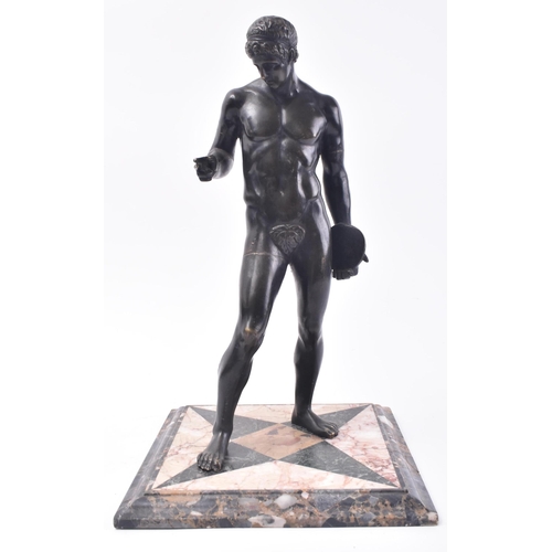 223 - A 19th century Grand Tour bronze sculpture in the form of a Greek discus thrower. The figure shown s... 