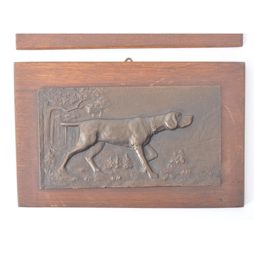 230 - A pair of late 19th century / early 20th century cast bronze plaques. Each relief cast with pointer ... 