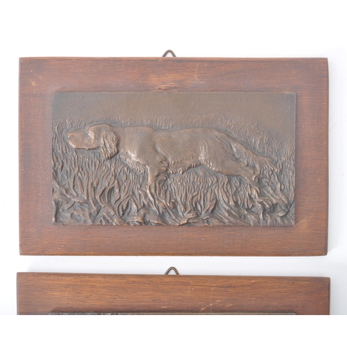 230 - A pair of late 19th century / early 20th century cast bronze plaques. Each relief cast with pointer ... 