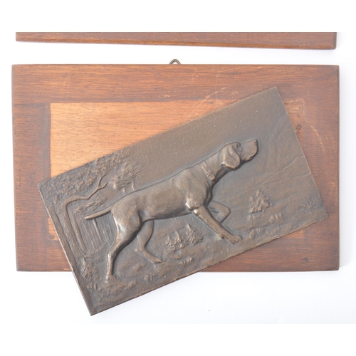 230 - A pair of late 19th century / early 20th century cast bronze plaques. Each relief cast with pointer ... 