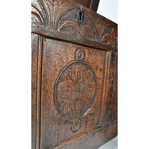 231 - A 17th century carved oak wood West Country coffer / blanket box chest. The coffer having a hinged t... 