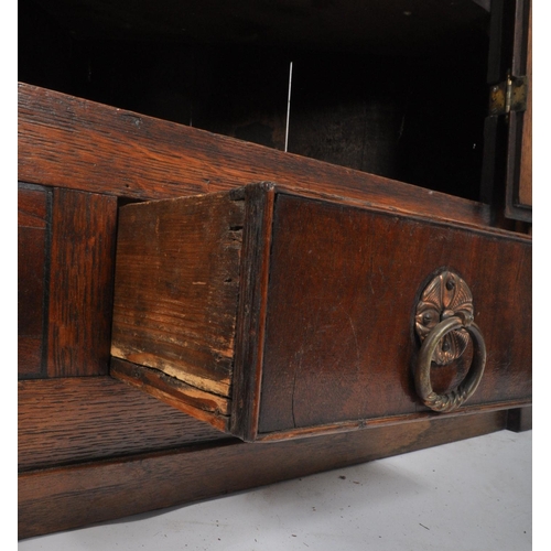 242 - A George III late 18th century oak & mahogany cross banded corner cupboard cabinet. The cabinet havi... 