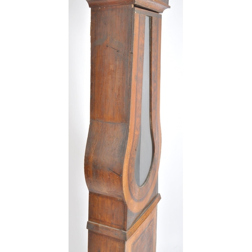 272 - A large 19th century French walnut comtoise longcase clock case. The tall walnut upright section wit... 