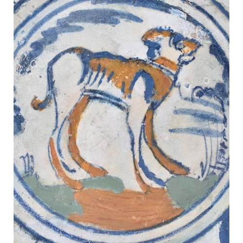 277 - A 17th century Italian maiolica hand painted plate. The plate with central painted dog with foliate ... 