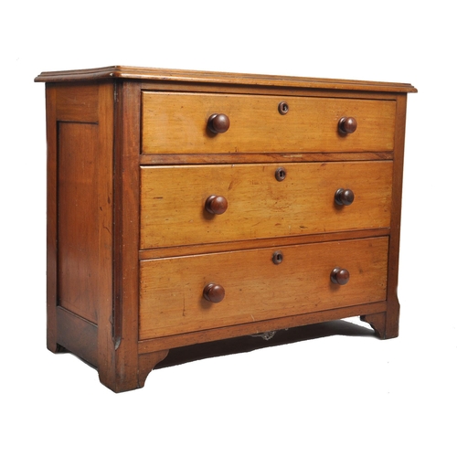 28 - A 19th century Victorian mahogany chest of drawers of low form. The chest having a straight bank of ... 