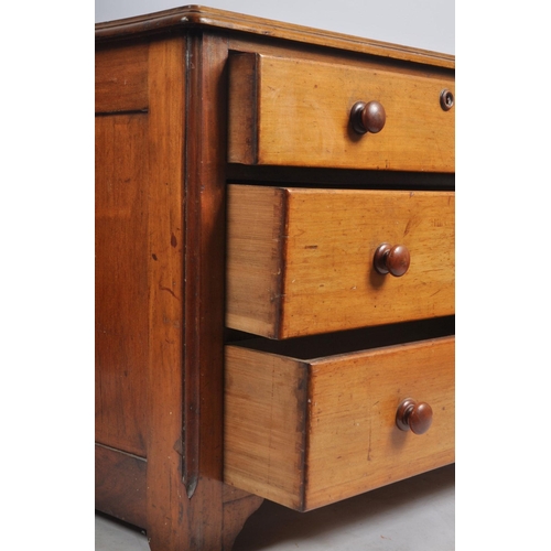 28 - A 19th century Victorian mahogany chest of drawers of low form. The chest having a straight bank of ... 