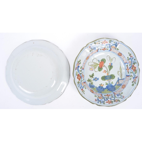 281 - A pair of 20th century Italian majolica ceramic hand painted 'Garofano Imola' plates / dishes. The c... 