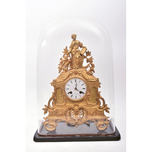 30 - A 19th century French gilt ormolu mantle clock by Vincenti & Cie. The mantel clock having a muse-lik... 