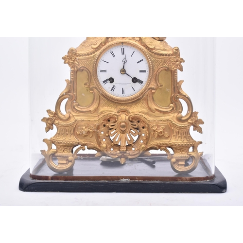 30 - A 19th century French gilt ormolu mantle clock by Vincenti & Cie. The mantel clock having a muse-lik... 