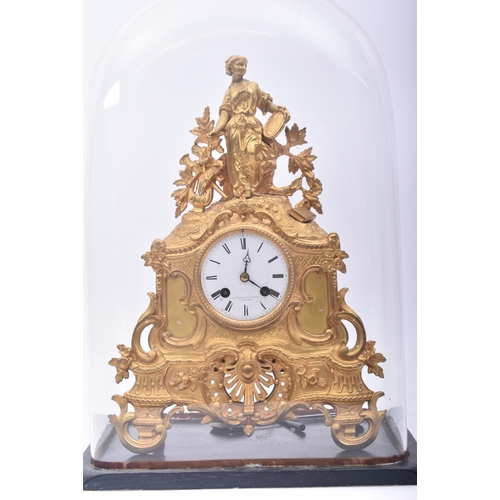 30 - A 19th century French gilt ormolu mantle clock by Vincenti & Cie. The mantel clock having a muse-lik... 