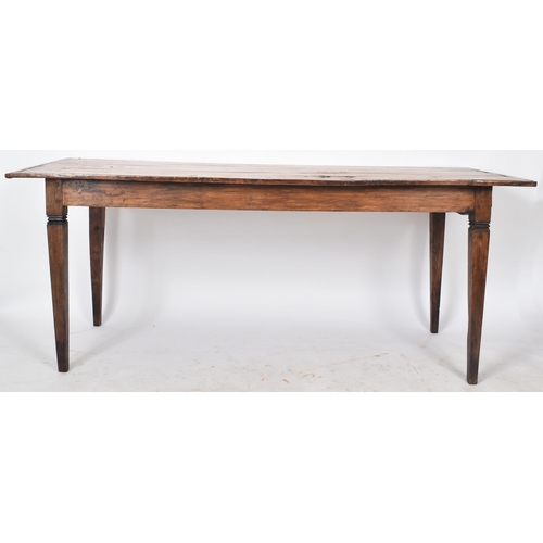 315 - A large 19th century French chestnut and elm refectory dining table / kitchen table. The table havin... 