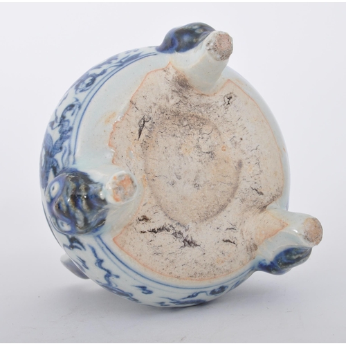 317 - A 19th century Chinese Qing Dynasty blue & white ceramic tripod censor. The censor having twin slip ... 