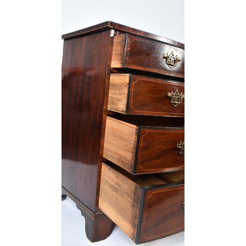 32 - A 19th century George III mahogany crossbanded bow front chest of drawers. The chest having a bank o... 