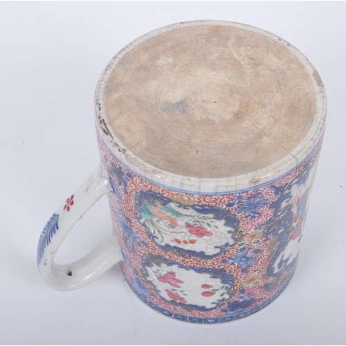 326 - An 18th century Chinese Oriental Qing Dynasty famille rose porcelain tankard. The mug decorated with... 