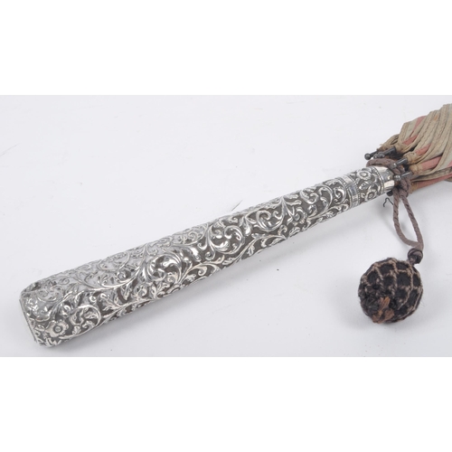 327 - A Victorian 19th century silver embossed handled ladies parasol umbrella. The umbrella having a flor... 