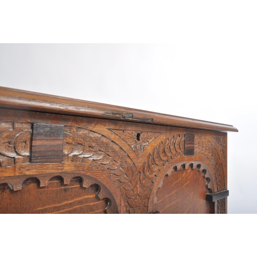 334 - An early 20th century Arts & Crafts small proportioned coffer chest. Of Pugin / ecclesiastical desig... 