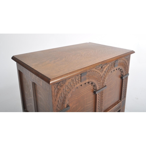 334 - An early 20th century Arts & Crafts small proportioned coffer chest. Of Pugin / ecclesiastical desig... 