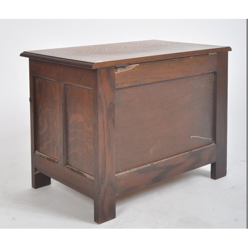 334 - An early 20th century Arts & Crafts small proportioned coffer chest. Of Pugin / ecclesiastical desig... 