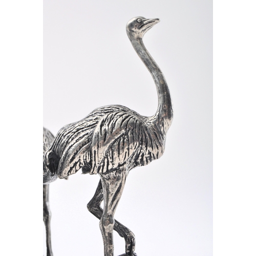 335 - An early 20th century silver electro plated ostrich egg centrepiece stand. The stand with Indian dec... 