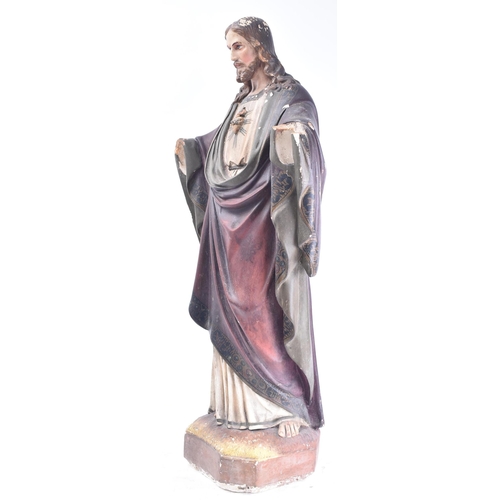 338 - A 20th century hand painted plaster / gesso religious figure of an arm-less Jesus with Sacred Heart.... 