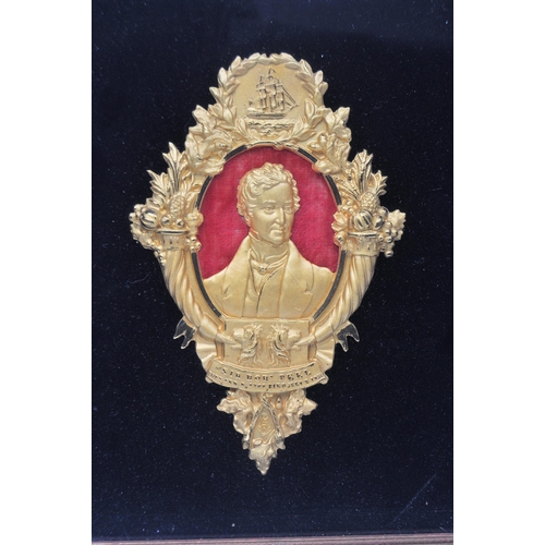 339 - A gilt metal commemorative plaque honouring the death of Robert Peel.  His portrait in an oval frame... 