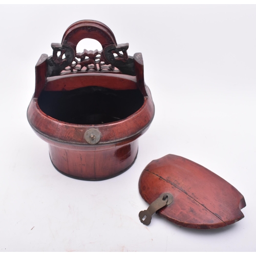 345 - A late 19th century Ming dynasty Chinese red lacquer wooden lidded Dabba / picnic basket. With intri... 