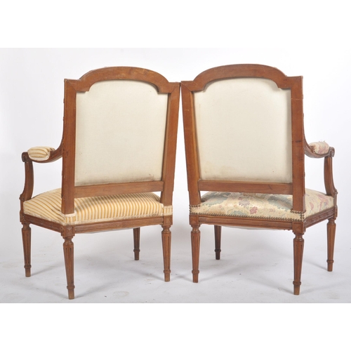 346 - A pair of 19th century French Napoleon III style walnut framed upholstered saloon armchairs / chairs... 