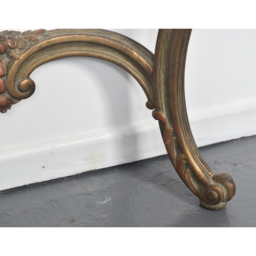 353 - A 20th century French Rococo revival marble topped console table. The table having petal pink marble... 