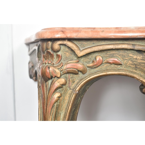 353 - A 20th century French Rococo revival marble topped console table. The table having petal pink marble... 