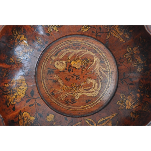 368 - An early 20th century wooden carved Japanese fruit bowl. The fruit bowl with floral and foliate gilt... 