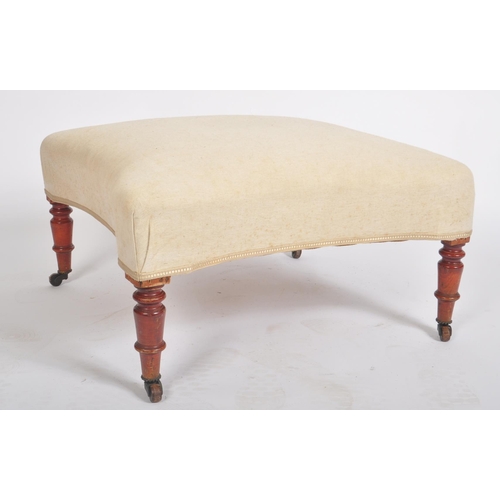 369 - A Victorian 19th century mahogany upholstered ottoman / foot stool. The ottoman having inverted bow ... 