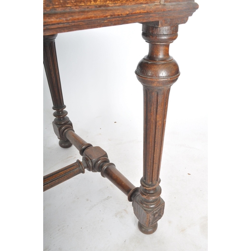 378 - A Victorian 19th century carved oak large writing table desk. The writing table having carved chamfe... 