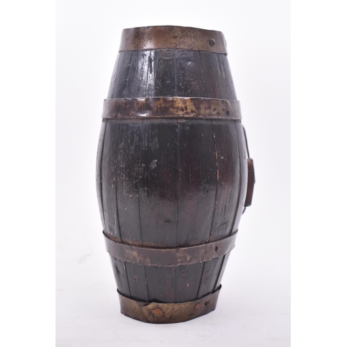 382 - A Victorian 19th century oak & brass bound carry-on barrel. The barrel having an elongated shape wit... 