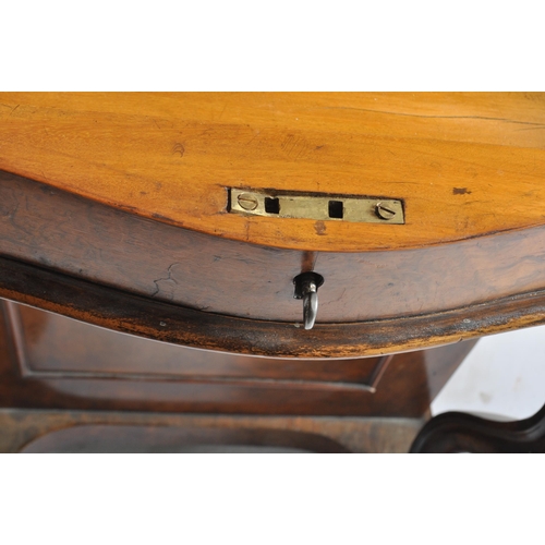 384 - A late 19th century Victorian walnut davenport writing bureau. The desk with inkwell stand shelf mou... 