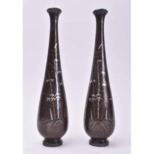 43 - A pair of 19th Century Chinese bronze vases. Each with calligraphy decorated bamboo shoots and cock ... 