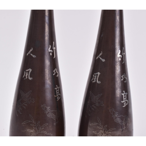 43 - A pair of 19th Century Chinese bronze vases. Each with calligraphy decorated bamboo shoots and cock ... 