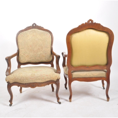 436 - A pair of Napoleon III 19th century French Continental oak framed upholstered hall armchairs / chair... 