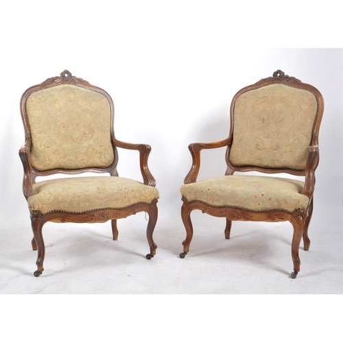 436 - A pair of Napoleon III 19th century French Continental oak framed upholstered hall armchairs / chair... 