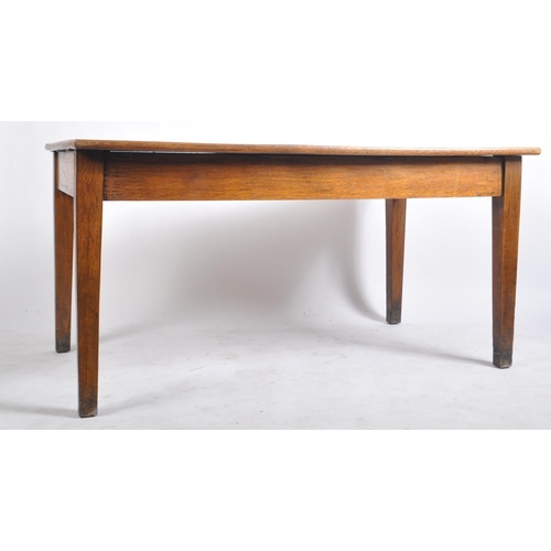 439 - An early 20th century railway / government oak writing table desk. Raised on square tapering legs wi... 