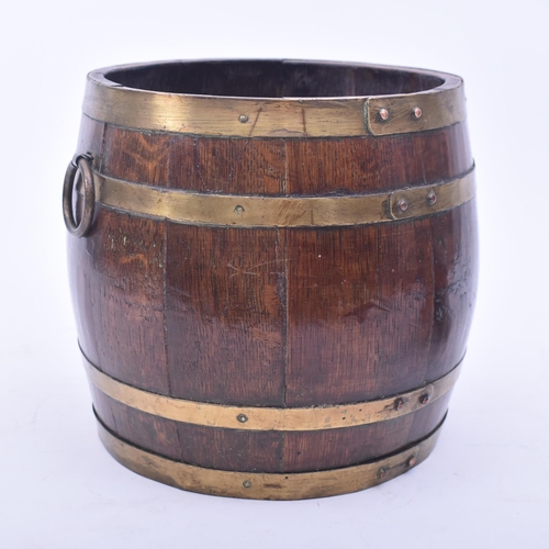 441 - A late Victorian 19th century oak & brass bound lidded Naval rum barrel. The barrel having a turned ... 