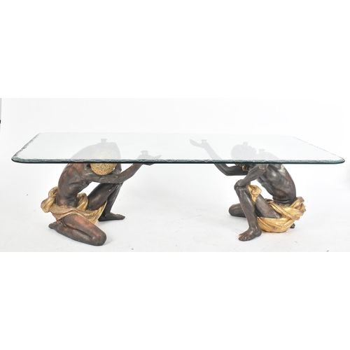 45 - A 20th century circa 1980s Italian Blackamoor resin & glass low coffee occasional table. The table h... 